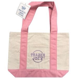 New with tags Trader Joe’s mini tote bags pink and white.